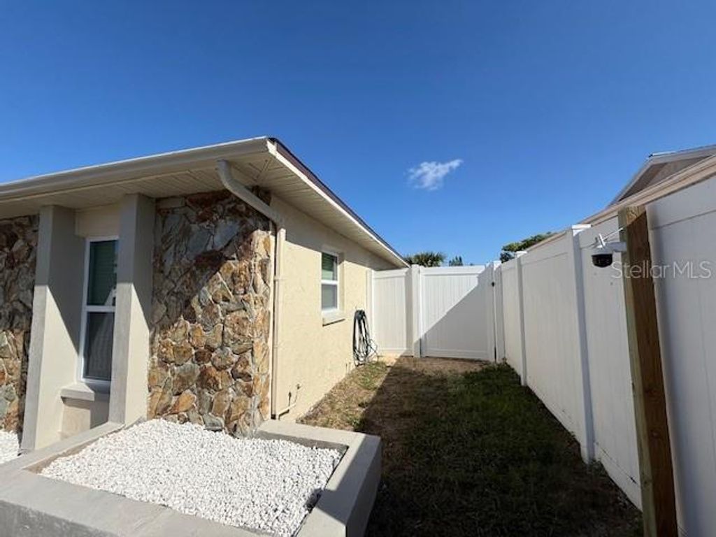 Photo of 8819 Woodmont Lane, Port Richey, FL 34668 (MLS # TB8494314)