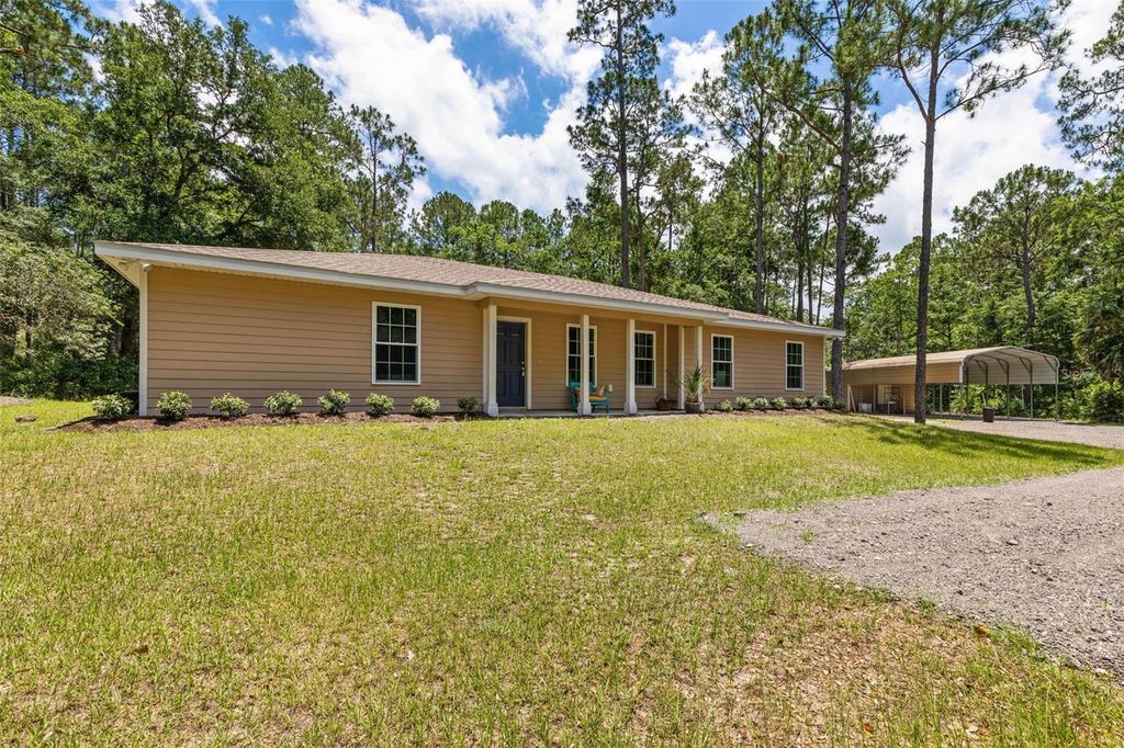 Photo of 3296 N Old Dixie Highway, Bunnell, FL 32110 (MLS # FC318844)