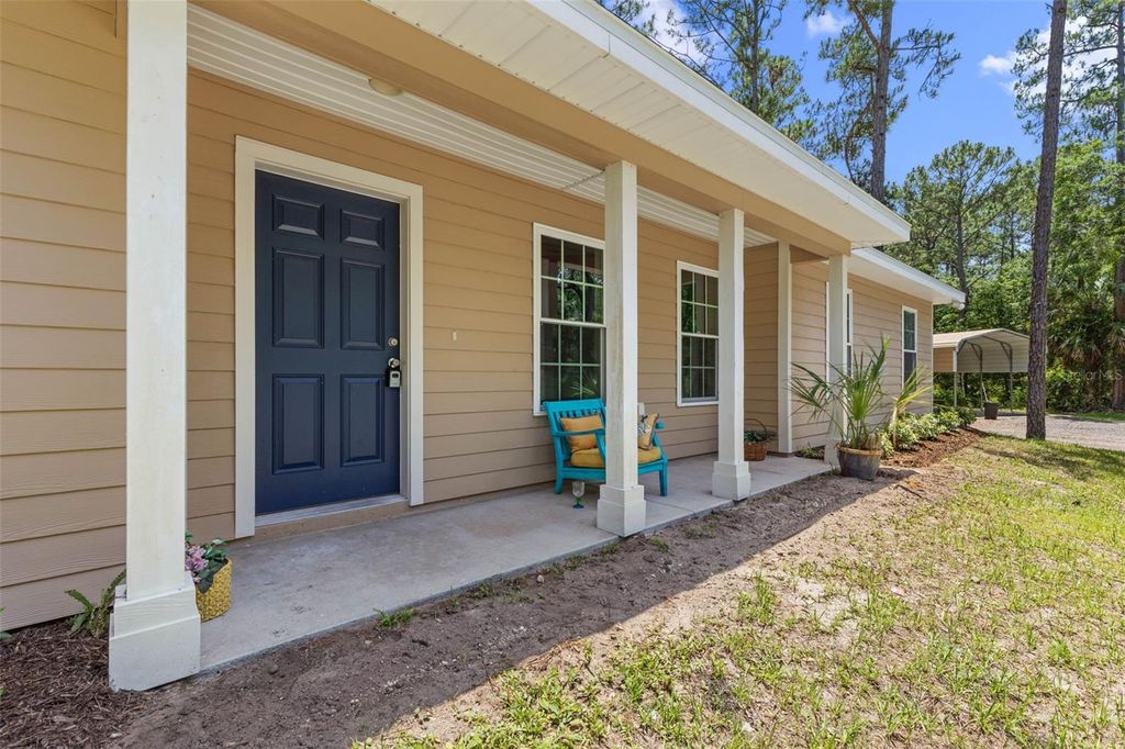 Photo of 3296 N Old Dixie Highway, Bunnell, FL 32110 (MLS # FC318844)