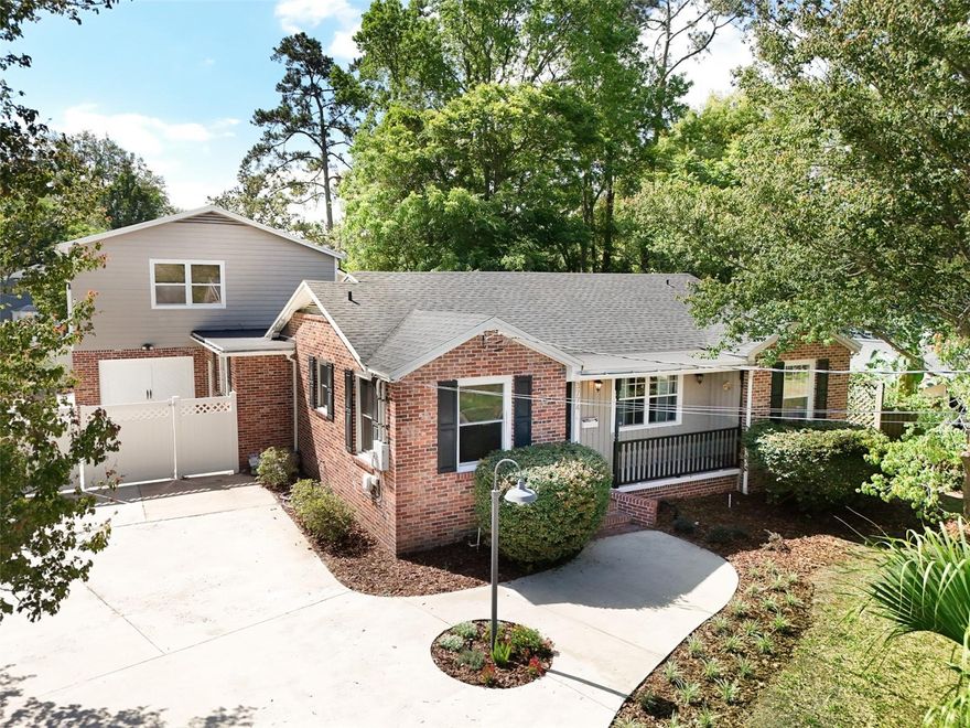 One or more photo(s) has been virtually staged. LARGE PRICE REDUCTION.....This beautiful Avondale home is the perfect combination between historical elegance and modern comfort. It is rich with historical features that are appealing to the eye and functional with a modern touch. Enjoy cooking a gourmet meal in your newly updated kitchen with beautiful wood cabinets, a over sized granite island perfect for entertaining and extended dinning space with built in butler area. Enjoy family time or a cozy afternoon in the spacious living room with fireplace. Original hardwood flooring through the main area of the home gives a very homey and authentic vide to this 1947 classic with Updated electrical and plumbing. Looking for some privacy? The master suite which can also be used as an in-law suite offers a separate entrance, living space, private bath and large walk in closet with custom closet system to keep all your necessities organized. This area can also be used as a flex space, excellent family room, man cave or hobby room. Due to the location of the laundry room a bathroom could be easy added. So many possibilities! The outdoor living space does not disappoint with a beautiful pergola, fireplace  and garden area featuring fruit trees and beautiful florals. Lots of space for parking up to 8 cars with a circular driveway and fenced parking area, fully fenced back yard and storage shed make living here a breeze.  Beautiful parks and favorite restaurants close by making this a perfect Jacksonville location.