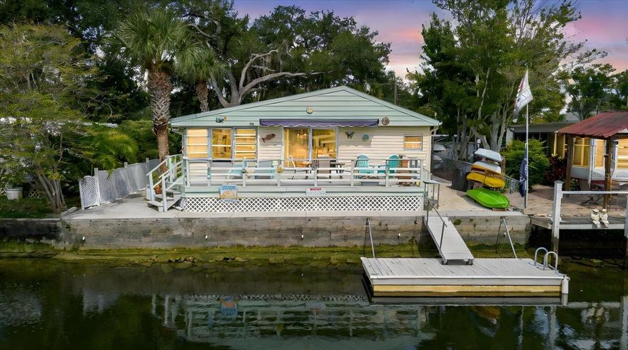 Welcome to your riverfront retreat! This beautifully updated 3-bedroom, 2-bath canal-front home offers the perfect blend of relaxation, recreation, and modern comfort on the Weeki Wachee River. Enjoy deep water access with a New floating dock and a reinforced seawall (2024), ideal for kayaking, fishing, or boating straight to the Gulf of America in just 15 minutes! Inside, you’ll find epoxy flooring throughout, new appliances, new hurricane-rated sliding doors, new interior PVC walls, new interior doors, and new light fixtures. The home also features energy-efficient wall A/C units (6 months old), a new water heater, and a newer roof (2016). The Jack and Jill bathroom, spacious kitchen, and Florida room with river views create a comfortable layout perfect for family and guests. Step outside to enjoy a new outdoor travertine patio floor, covered carport, and the tranquil setting of “Old Florida” charm where you can swim, fish, or paddle in the crystal-clear spring water. Kayaks are included! Located in a prime central location, you’re just minutes from shopping, dining, and entertainment, yet worlds away from the hustle and bustle. No HOA, No CDD fees, and No restrictions! Make this home your getaway all year round or a perfect short-term rental opportunity, it comes fully furnished and ready to enjoy!