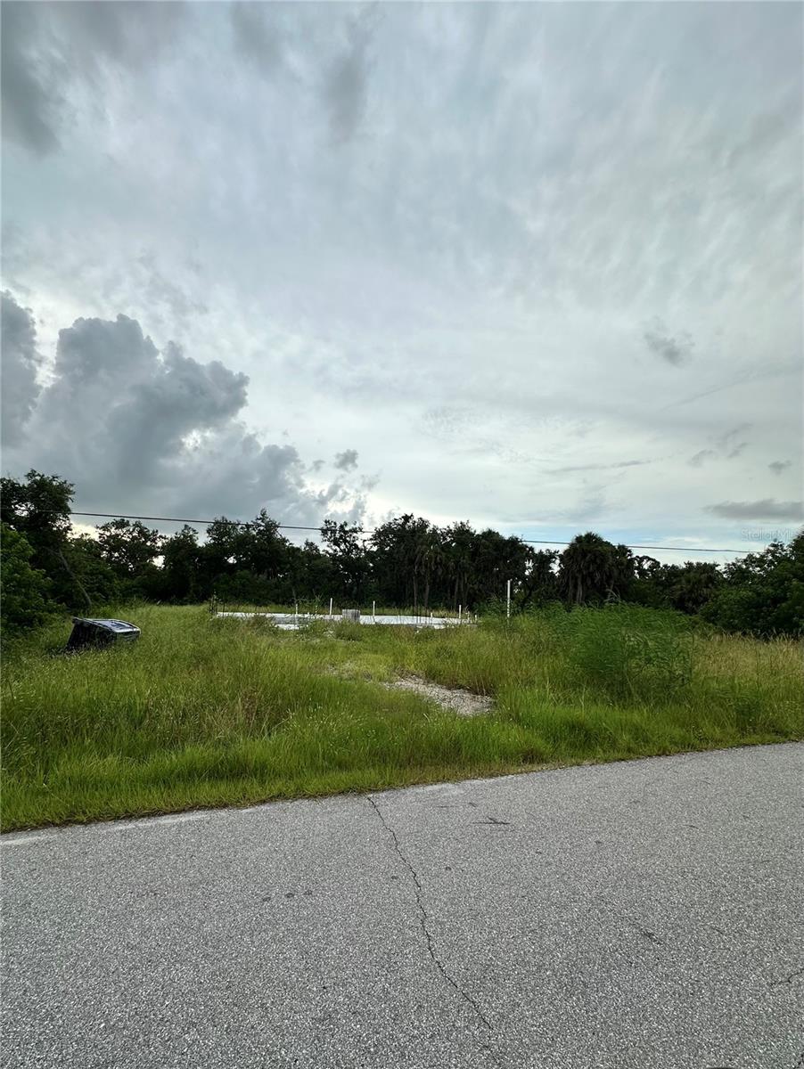 Exceptional opportunity to own a vacant lot in a desirable Rotonda Heights area of Rotonda West, Florida! The spacious home site offers the perfect canvas to build YOUR dream home in a peaceful, well established neighborhood. Even better – the ADJACENT Lot is also available, featuring a concrete slab already in place, ideal for a buyer looking to take over and complete a custom project. Purchase BOTH properties for a combine estate – sized parcel, or develop them individually. Convenient to the beautiful beaches of Boca Grande, Englewood and Minnesota, world-class fishing, boating, restaurants, shopping, and so much more.