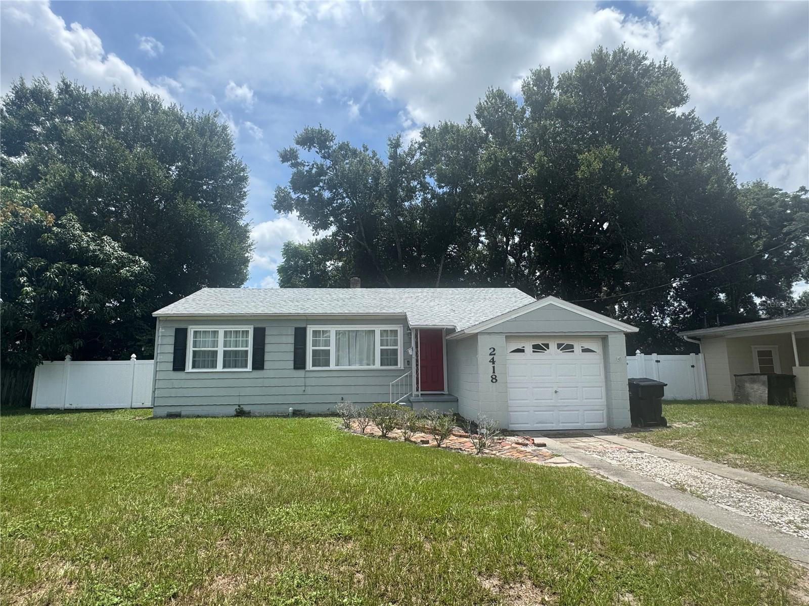 This charming 3-bedroom, 1-bath, single-family home is located at 2418 Montana Street in Orlando, offering a convenient living space just minutes from downtown. The home features a mix of wood, tile, and carpeted flooring, along with an updated kitchen that provides plenty of cabinet space. The two guest bedrooms have plenty of closet storage, and there is a versatile bonus room off the back of the kitchen, ideal for a home office, playroom, or additional living area. The fenced-in backyard and laundry hookups, located in the garage, includes a washer and dryer (not warranted). Nestled in a residential neighborhood, the home is close to shopping, dining, parks, and major roadways, making commuting a breeze. Small pets may be considered. Don’t miss out, contact us today!