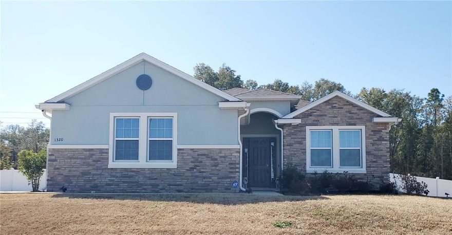 Beautiful 4/3 Split-Block Smart Home in the family friendly neighborhood of Deer Park Estates.  A modern 4-bedroom, 3-bath split-plan smart home featuring 2,700 sq. ft. of living space on more than a half acre that is surrounded by easy to maintain vinyl fencing.  Walk into the front door and you are greeted by an abundant open floor plan complete with tray ceilings adding a touch of class.  This home combines classic design with modern amenities, ideal for comfortable family living or hosting guests. The huge kitchen features a large pantry, an oversized eat-in area and a larger than standard breakfast nook. The primary bedroom offers an elegant tray ceiling, an ensuite bath and huge walk-in closet.  Guest rooms at the front of the home gives an excellent layout for added comfort and easy access for your guests. Pocket doors throughout the home provide privacy at any time.  Located conveniently close to Silver Springs State Park home of the glass bottom boats and less than 4 miles from Carney Island State Park where you can fish, launch a boat, or swim in big Lake Weir.  Hit the main drag right around the corner and have access to all the familiar grocery stores, schools and churches. A great place to live, work and play come schedule a time today! Professional pics coming soon!