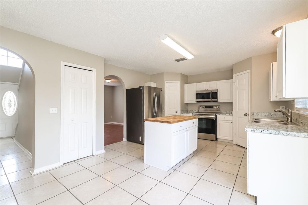Photo of 677 Milan Drive, Kissimmee, FL 34758 (MLS # TB8450362)