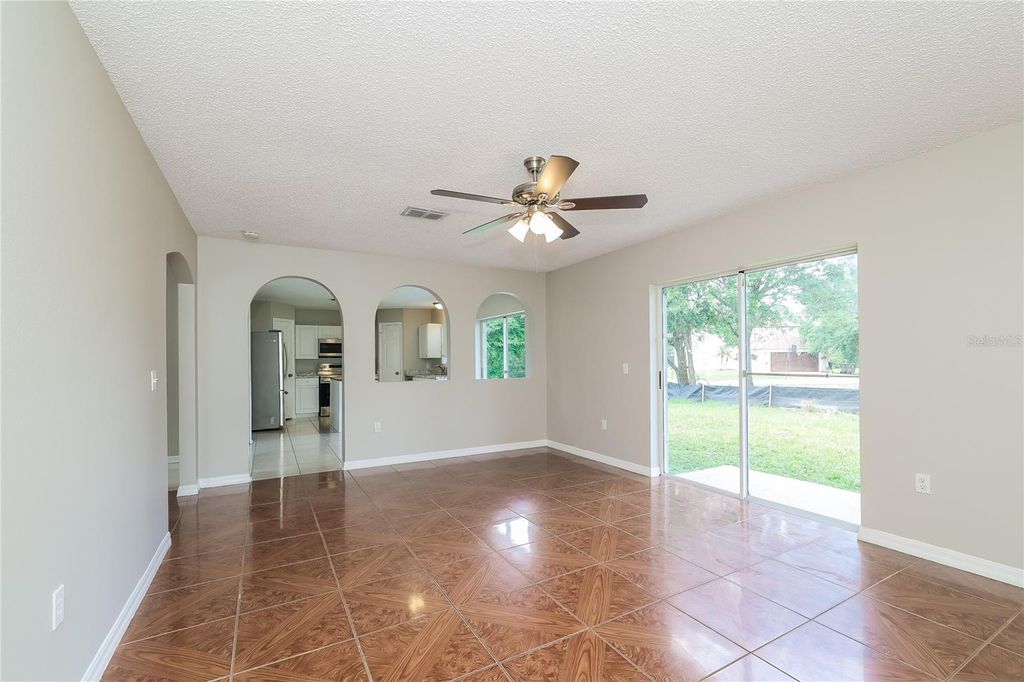Photo of 677 Milan Drive, Kissimmee, FL 34758 (MLS # TB8450362)
