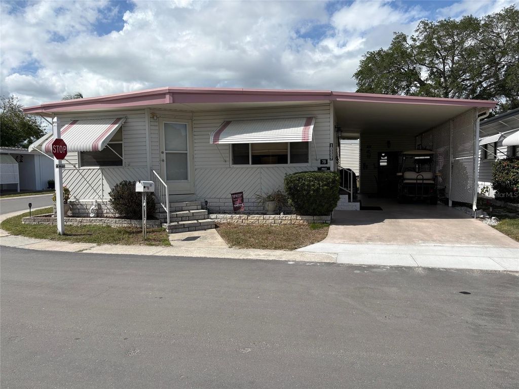 Photo of 10297 N Lake Drive #79, Largo, FL 33773 (MLS # TB8496163)