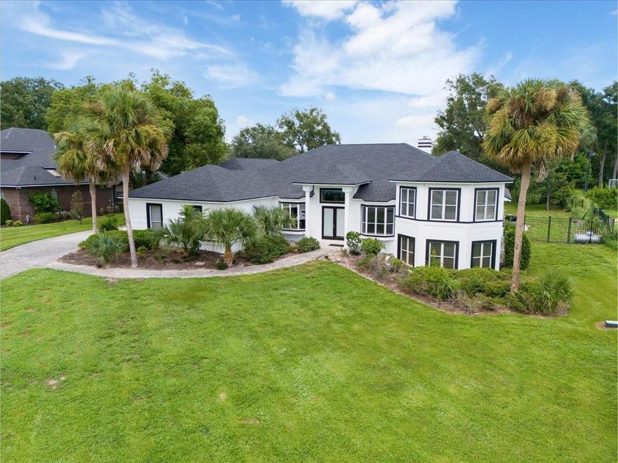 Exceptional Contemporary Estate in the Heart of Windermere!

Discover the perfect blend of modern design, timeless comfort, and unmatched location with this beautifully updated estate home, ideally situated on a 1-acre lot in the desirable Town of Windermere. Surrounded by multi-million-dollar residences, and just moments from the famed Butler Chain of Lakes, this property offers a rare opportunity to enjoy luxury living in one of Central Florida’s most desirable communities.

Step inside and be greeted by natural light pouring through every room, highlighting fresh interior paint (2025) and warm wood flooring. The open-concept floor plan creates an effortless flow between living, dining, and entertaining spaces, anchored by a cozy wood-burning fireplace. Offering incredible flexibility, the home features two primary suites—perfect for multi-generational living or guest accommodations—along with a dedicated flex room to adapt to your lifestyle.

Designed for both relaxation and recreation, the home’s outdoor living spaces are a true highlight. A screen-enclosed pool and spa, expansive covered lanai, and lush surroundings create the perfect backdrop for year-round Florida living. For those with a passion for travel or hobbies, the oversized 48x20 recreational garage provides exceptional space for a motor coach, RV, or boat.

With a brand-new roof (2025), freshly painted exterior (2025), and durable block construction, this home is move-in ready while still offering room for expansion.

Located within the coveted A-rated school district, close to charming downtown Windermere, world-class golf, and renowned shopping and dining, this residence offers not just a home, but a lifestyle. Owner finance options available.

Don’t miss your chance to own a piece of Windermere luxury — where contemporary elegance, everyday comfort, and premier location meet.
