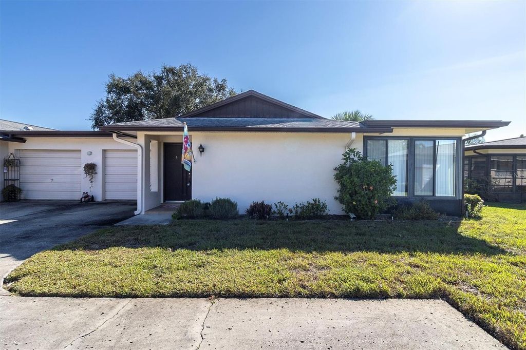 Photo of 2846 Highlands Boulevard #D, Palm Harbor, FL 34684 (MLS # TB8438449)