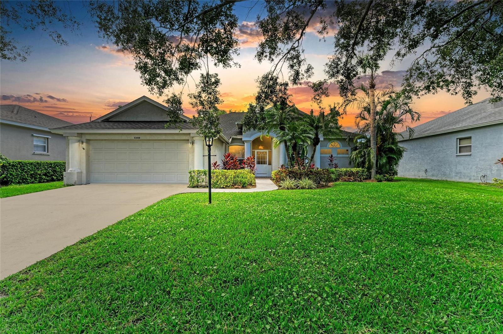 One or more photo(s) has been virtually staged. Luxury Florida Living in Carlyle at Village of Palm-Aire – Heated Saltwater Pool | New Roof (2024) | No CDD
Welcome to your beautiful 4-bedroom, 2-bathroom home, (the 4th bedroom is currently utilized as an office), nestled in the highly sought-after Carlyle at The Village of Palm-Aire. This immaculately maintained residence offers 2,108 sq. ft. of stylish, comfortable living, perfectly blending sophistication and ease in one of Sarasota’s premier communities.
Step inside to discover an open, light-filled split floor plan with soaring tray ceilings, crown molding, and clerestory windows that invite the Florida sunshine into every corner. The versatile den, enclosed with elegant French doors, provides the perfect work-from-home space or guest room.
The kitchen offers stainless steel appliances with granite countertops and a sunlit breakfast nook. The expansive living and family rooms flow seamlessly to the outdoors, where multiple sliding glass doors disappear into the walls, opening to your private oasis—a screened, extended lanai with a heated saltwater pool where a serene setting for relaxing or entertaining await.
Retreat to the primary suite featuring dual walk-in closets and a spacious en-suite bath with double vanities and a walk-in shower. Two additional bedrooms give comfort and privacy for family or guests. A new roof has recently been added -2024.
Enjoy resort-style amenities within the community, including pickleball, tennis courts, a sparkling community pool and playground. Golfers and socialites will love the optional memberships at the nearby Palm-Aire Country Club, offering premium golf and clubhouse amenities.
Ideally located near the University Parkway/UTC corridor, you’re just minutes from Downtown Sarasota, St. Armands Circle, award-winning beaches, fine dining, shopping, and Sarasota International Airport (only 15 minutes away). With no CDD fees and low HOA dues, this home offers luxury and convenience in a vibrant, amenity-rich neighborhood.
Don’t miss the opportunity to make this Florida dream home yours—schedule your private showing today!