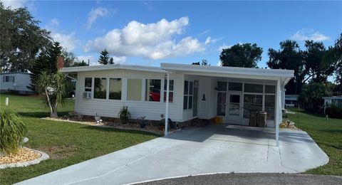 Photo of 102 Tangelo Cove, Leesburg, FL 34748 (MLS # R4909336)