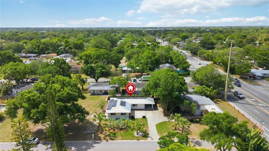 SAY HELLO TO A GOOD BUY * This home has been LOVINGLY RENOVATED * NEW Kitchen with NEW Cabinets & Countertops & NEW Appliances * NEW Bathroom with NEW Vanity &  NEW Shower * NEW Tile Flooring * NO Carpet * NEW Paint * Metal Roof * Solar Panels so you have a very low electric bill * LARGE Carport & Storage Room * This house is beautiful with a very large Living Room & Dining Room - there's a lot of A/C Living Space * Spacious Front Yard * Paver Park area is located in a great school district * You are minutes to Payne Park and a few blocks to The Legacy Trail * Short bike ride to Downtown and the Bay Front * Short car ride to Selby Botanical Gardens, Siesta Key, St Armand's Circle & Lido Beach * This is an EXCELLENT year round home OR winter getaway * One look & you'll fall in love * Run, don't walk to this INCREDIBLE VALUE *