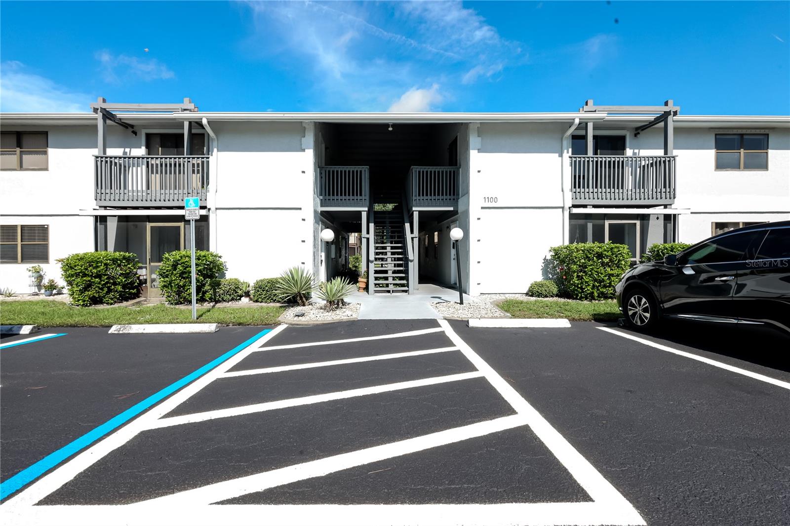 Move in Ready 2/2 Second Floor Unit with a beautiful Balcony! Seller is currently painting and completing finishing touches for the next owner. Plenty of Parking and Washer and Dryer in unit!