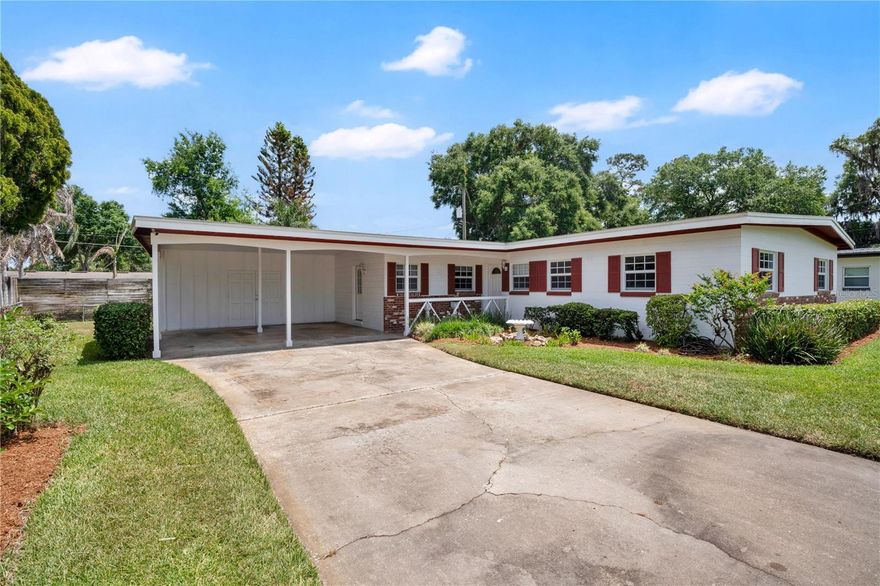 Tucked at the end of a quiet cul-de-sac in one of Orlando's most established pockets, this home is ready for its next chapter. The roof was replaced in 2020, so the big-ticket item is already behind you. What's left is the fun part: making it yours. Inside, just under 1,900 square feet stretches out across a layout that actually lives like more. The living room runs nearly the full depth of the house and anchors around a classic brick fireplace, while a separate family room with original beamed ceiling sits at the back of the home and opens directly to the screened porch. A dedicated dining room sits between the kitchen and family room, giving you real separation between everyday living and entertaining. The kitchen is functional and bright, with a window over the sink and a pass-through to the dining space. Three bedrooms and two full baths sit on their own wing, tucked away from the main living areas. Closet space throughout is generous for a home of this era, a detail that's harder to find than it sounds. Step outside and the porch does the talking. Massive, fully screened, and stretching across the back of the home, it's the kind of outdoor space Florida buyers chase and rarely find at this size. Beyond it, a fully fenced backyard gives you room for whatever's next: garden, pool, play space, all of it. The location does heavy lifting too. You're zoned for Pershing K-8 and Boone High School (Go Braves!), and minutes from everything that makes 32806 one of the most in-demand corridors in Orlando. The SoDo District puts Target, Foxtail Coffee, 4 Rivers Smokehouse, Rockpit Brewing, Delaney's Tavern, and Freshfields Farm all within a quick drive. Orlando Health is just up the road, downtown is ten minutes away, and the Hourglass District, Conway, Lake Holden, and Wadeview Park are all in your everyday orbit. Orlando International Airport is a straight shot down the 528. Solid bones. Honest layout. Great roof. The vision is yours to bring.