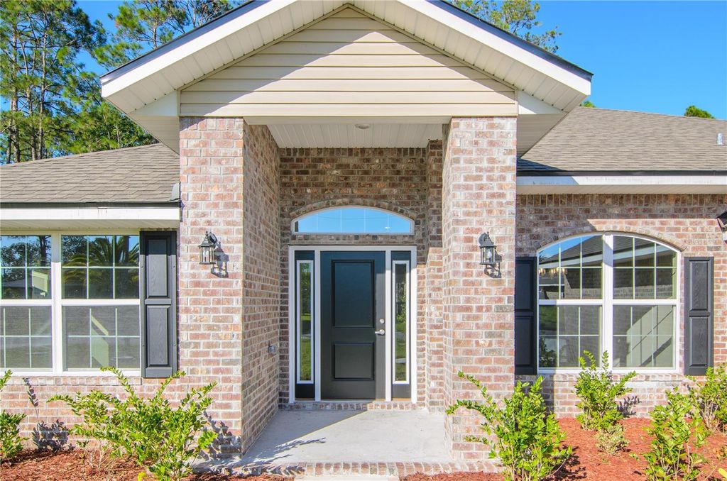 Photo of 42 Universal Trail, Palm Coast, FL 32164 (MLS # FC315859)