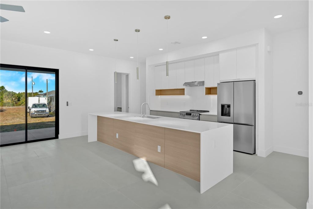 Photo of 10065 Memphis Street, Port Charlotte, FL 33981 (MLS # D6148352)