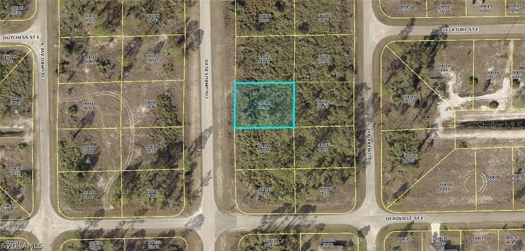 Photo of 1121 Columbus Boulevard, Lehigh Acres, FL 33974 (MLS # O6450212)