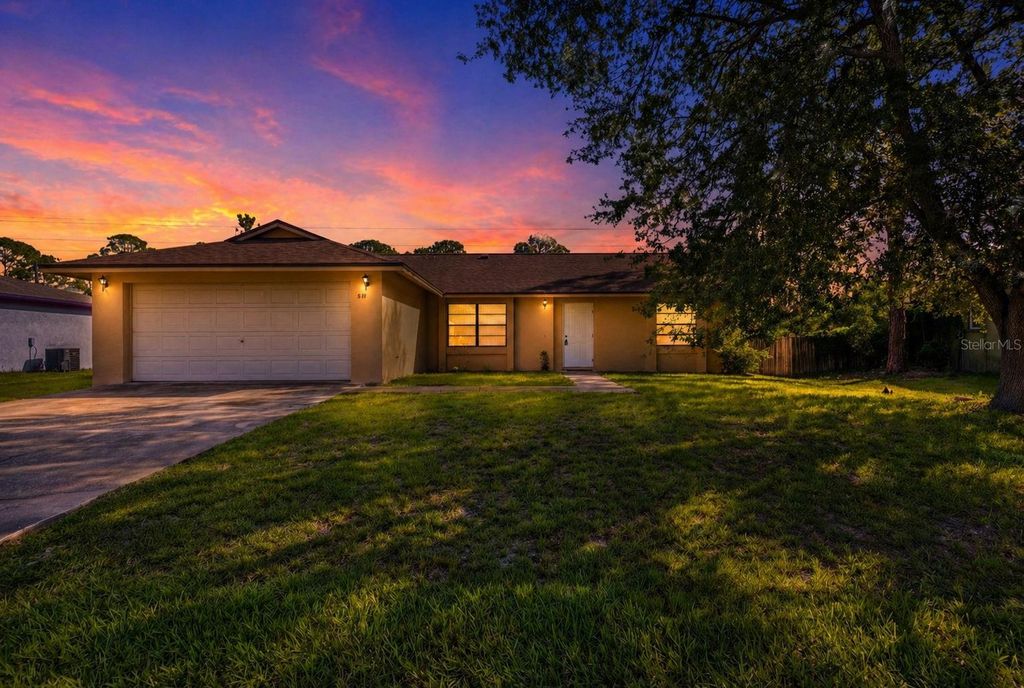 Photo of 871 Lamplighter Drive NW, Palm Bay, FL 32907 (MLS # O6402859)