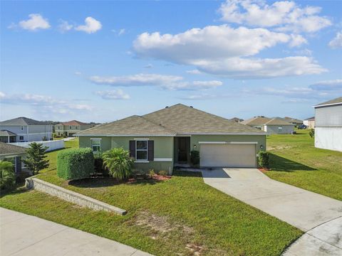 Photo of 2305 Gladiolus Lane, Mascotte, FL 34753 (MLS # O6370447)