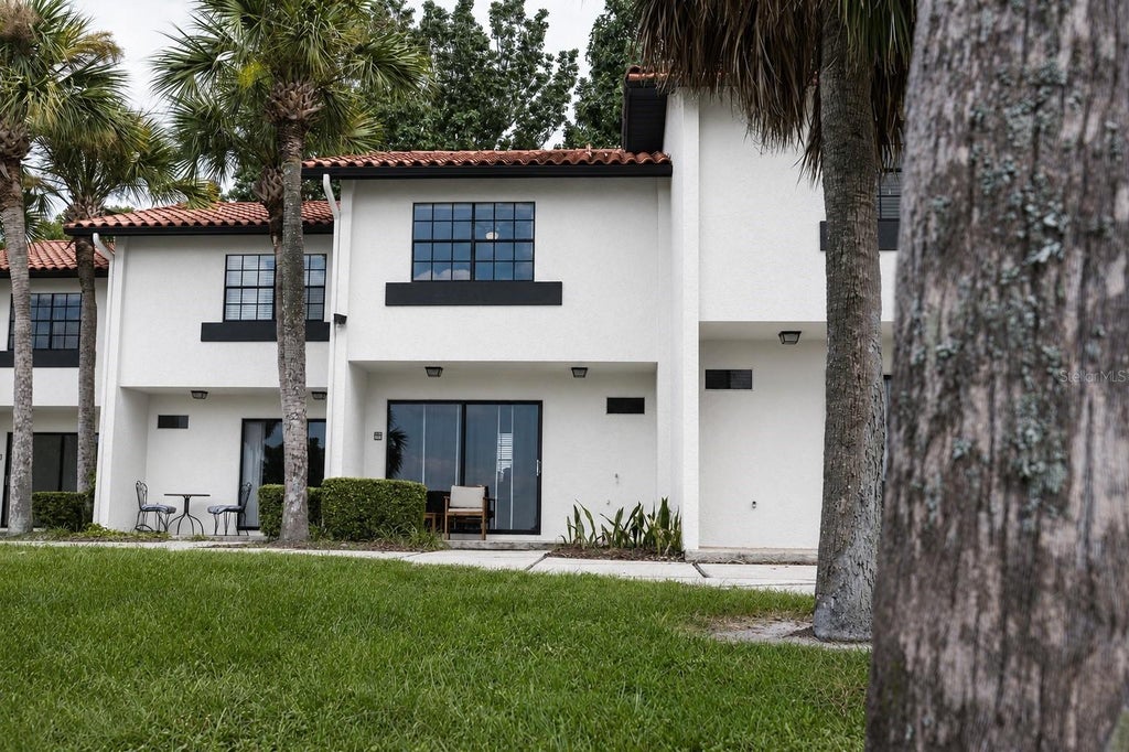 Photo of 10330 Turkey Lake Road #109, Orlando, FL 32819 (MLS # O6422584)