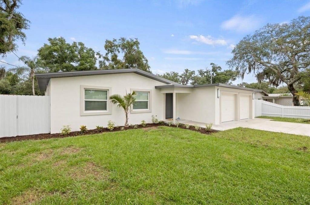 Photo of 817 W Bougainvillea Avenue, Tampa, FL 33612 (MLS # O6447656)