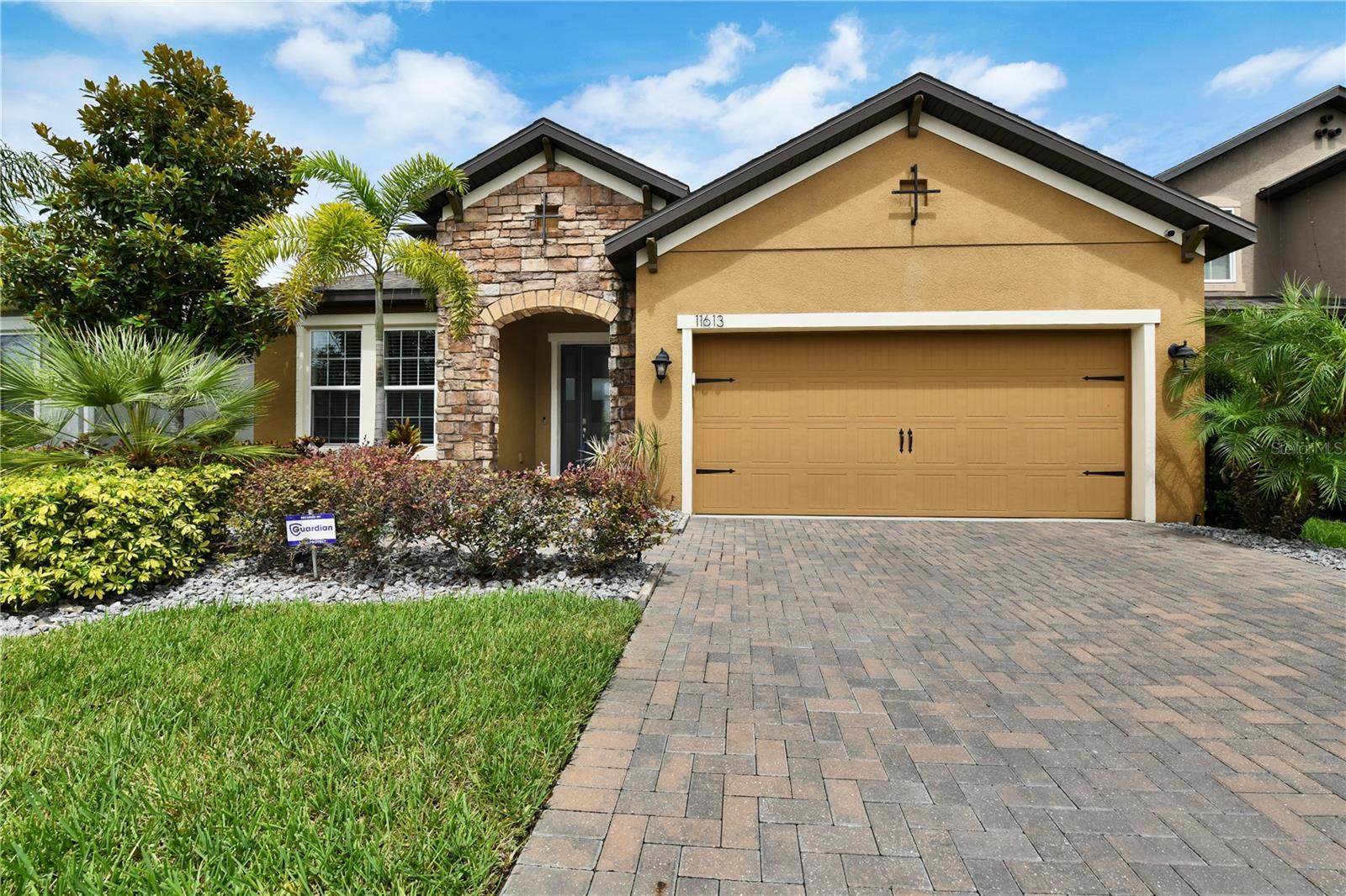 Welcome to Your Dream Home in The Reserve at Westchase. Experience refined living in this beautifully maintained 5-bedroom, 3-bathroom home, with a loft, nestled within the exclusive gated community of The Reserve at Westchase - Citrus Park. Boasting over 3,200 sq. ft. of thoughtfully designed space, this two-story residence seamlessly blends modern sophistication with everyday comfort, ideal for families, entertaining, or working from home. The moment you arrive, you'll be drawn in by the home's impressive curb appeal and elegant architectural details. Walk up to the front entry frosted glass door and step inside to an open and airy floor plan highlighted by vaulted ceilings, polished wood stairs, and iron spindle railings, creating a stylish and welcoming atmosphere. The main level features four generously sized bedrooms, including A Jack-and-Jill suite with double sinks, a guest bedroom, and a split-plan primary master suite for added privacy. Three full bathrooms on the main floor for maximum convenience. This open-concept living space connects the family room, dining area, and kitchen, and is perfect for gatherings and everyday living. Chef-Inspired kitchen is designed for both function and flair. The kitchen includes: Granite countertops, a stylish backsplash, 42" upper cabinets for ample storage, Stainless steel appliances, a large center island for prep, dining, and entertaining. Additional freestanding cabinet with granite top, and a walk-in pantry with wall-to-wall shelf space. Escape to your sanctuary retreat -inside the private primary suite featuring: Two walk-in closets, a spa-like bathroom with dual vanities and a walk-in shower. Stroll outdoors to the backyard oasis for entertainment inside the fully screened lanai, complete with: Concrete deck pavers, a built-in fire pit, an outdoor fan, and a TV mount creates a perfect space for cozy evenings or a casual get-together. Upstairs offers a versatile loft with high ceilings, ideal for use as a media room, home gym, or playroom. A private 5th bedroom and an adjacent full bathroom make the upstairs second level perfect for guests or a home office. Additional Highlights: property sits on a 6,030 sq. ft. lot with a 2-car garage, Energy-efficient construction, Custom shutters, New A/C unit under warranty, Home water filtration system (conveys), Smart home security equipment (conveys; buyer must activate service), additional TV wall mounts conveys. No CDD fees and low HOA dues, a separate laundry room with large built-in cabinets. The washer and dryer do not convey. This prime location is just minutes from shopping, dining, and top-rated schools in the vibrant Westchase area. The home offers the perfect blend of space, style, and convenience. Do not miss this rare opportunity to schedule your private showing today and experience the best living in the sought-after The Reserve at Westchase!