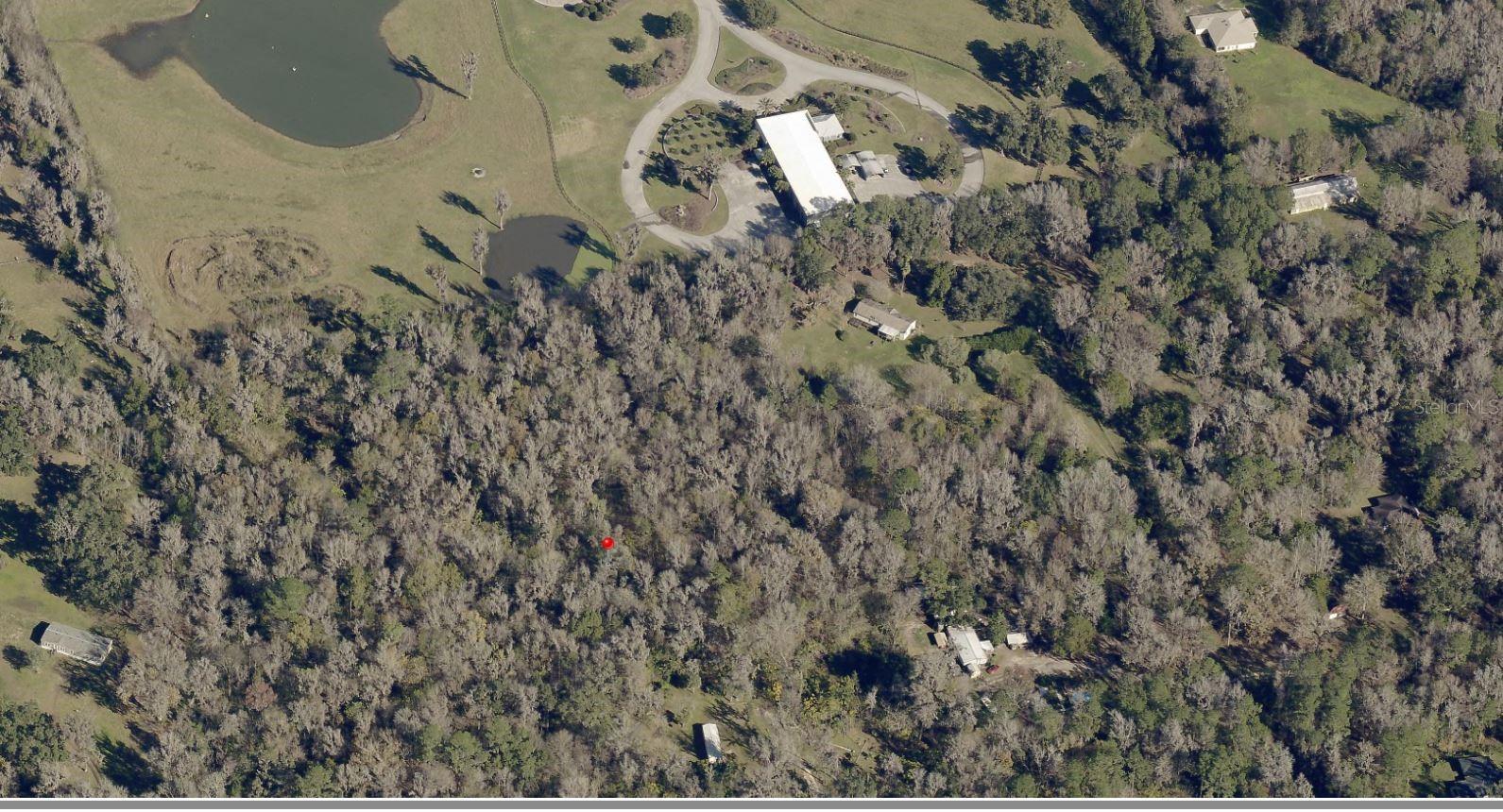 Escape the Noise, Embrace the Lifestyle ? Imagine waking up every morning to the sounds of nature, in a setting that feels worlds away from the hustle yet keeps you just minutes from shopping, dining, entertainment, and essential services. This spacious 0.40 acre homesite offers the perfect blend of privacy, convenience, and opportunity. Located in a thriving area surrounded by beautiful new construction, this lot boasts paved road access, no HOA restrictions, and site-built homes only ensuring a quality, cohesive neighborhood streetscape. Whether you already have a dream home design in mind or want to connect with one of our trusted local builders, the possibilities here are endless. The location is unbeatable: close enough to enjoy all the city conveniences without giving up the peace and quiet you crave. With property values rising and the area growing rapidly, opportunities like this don’t come around often.