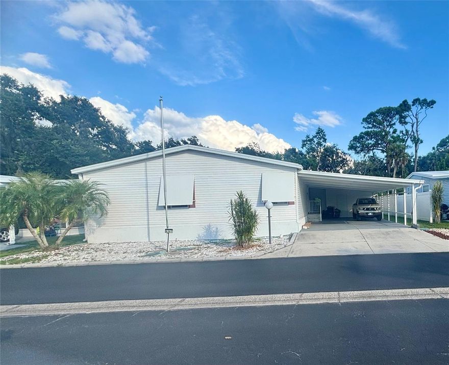 Welcome to this charming 2002 Terra Siesta manufactured home that proves good things come in well-planned packages. This spacious 2,201 square foot residence features three comfortable bedrooms and two full bathrooms, offering plenty of room for family living or hosting guests. 

The home received 2 major improvements in 2021- a brand new roof and air conditioning system, because nobody wants to sweat the small stuff – or the big stuff, for that matter. The open floor plan maximizes the generous square footage, creating an inviting atmosphere that flows naturally from room to room. An abundance of parking under the XL carport. 

What truly sets this property apart is the vibrant community lifestyle it offers. Residents enjoy access to two sparkling pools perfect for morning laps or afternoon relaxation, plus two clubhouses that serve as social hubs for the active neighborhood. Recreation enthusiasts will appreciate the shuffleboard courts, bocce ball areas, and pickle ball facilities, while pet owners love the dedicated dog park where four-legged family members can make new friends. All this for the low HOA of $171. monthly. 

The location strikes an ideal balance between peaceful residential living and convenient access to everyday necessities. ALDI, Lowes, Marshalls and Publix sit just minutes away for grocery runs,  as well as many restaurants for breakfast, lunch or dinner. The proximity to major highways means Tampa, Saint Petersburg, and Sarasota are all easily accessible for work, entertainment, or weekend adventures.

This property represents an excellent opportunity for buyers seeking a home in an established community with endless possibilities for personalization and enjoyment.