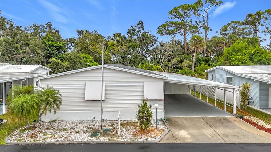 NEW PHOTOS- take a look at this....Welcome to this charming 2002 Terra Siesta manufactured home that proves good things come in well-planned packages. This spacious 2,201 square foot residence features three comfortable bedrooms and two full bathrooms, offering plenty of room for family living or hosting guests. 

The home received 2 major improvements in 2021- a brand new roof and air conditioning system, because nobody wants to sweat the small stuff – or the big stuff, for that matter. The open floor plan maximizes the generous square footage, creating an inviting atmosphere that flows naturally from room to room. An abundance of parking under the XL carport. 

What truly sets this property apart is the vibrant community lifestyle it offers. Residents enjoy access to two sparkling pools perfect for morning laps or afternoon relaxation, plus two clubhouses that serve as social hubs for the active neighborhood. Recreation enthusiasts will appreciate the shuffleboard courts, bocce ball areas, and pickle ball facilities, while pet owners love the dedicated dog park where four-legged family members can make new friends. All this for the low HOA of $171. monthly. 

The location strikes an ideal balance between peaceful residential living and convenient access to everyday necessities. ALDI, Lowes, Marshalls and Publix sit just minutes away for grocery runs,  as well as many restaurants for breakfast, lunch or dinner. The proximity to major highways means Tampa, Saint Petersburg, and Sarasota are all easily accessible for work, entertainment, or weekend adventures.

This property represents an excellent opportunity for buyers seeking a home in an established community with endless possibilities for personalization and enjoyment.