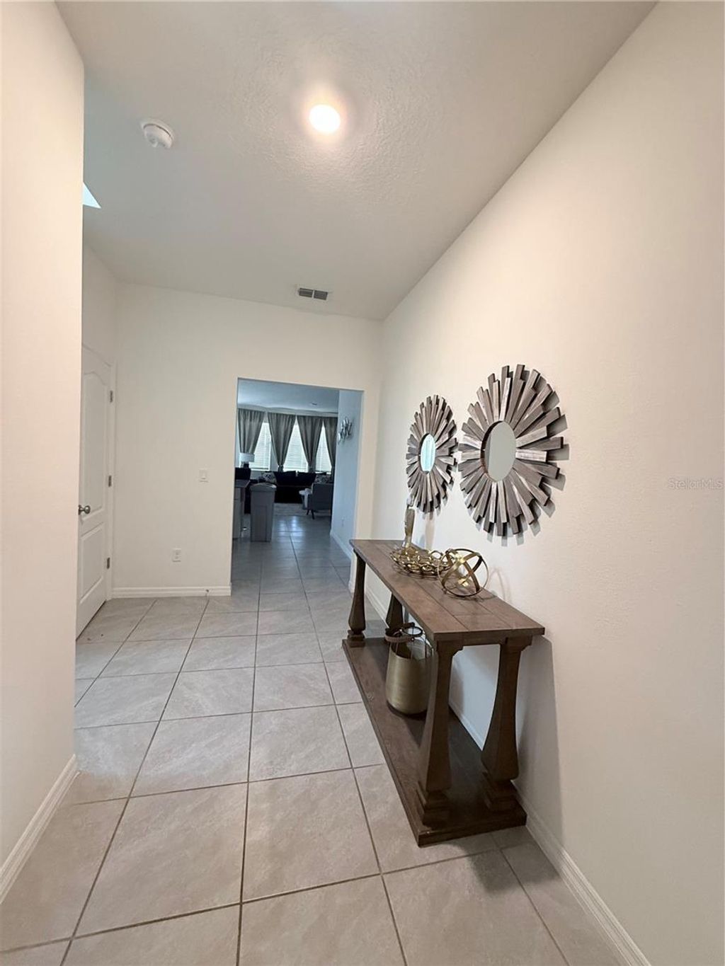 Photo of 7523 Oakmoss Loop, Davenport, FL 33837 (MLS # O6379324)