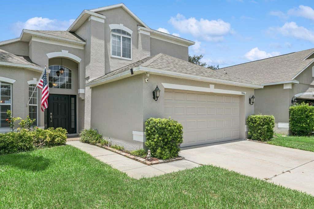 Photo of 9966 Hidden Dunes Lane, Orlando, FL 32832 (MLS # O6428875)