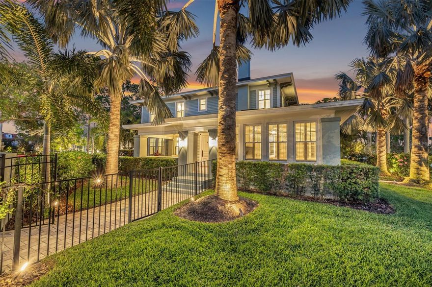 Have you ever dreamed of stepping inside the pages of Architectural Digest? Here is your chance to experience a truly exceptional opportunity. Welcome to 1505 Beach, a captivating pool home that exudes historic allure, gracefully positioned on a beautifully landscaped corner lot, offering ample privacy on one of the most iconic streets in highly sought-after Historic Old Northeast. From the moment you pass through the gates onto the meticulously maintained grounds, the home's timeless appeal is unmistakable. The privacy of the corner lot allows for an idyllic setting, complete with a tropical saltwater pool, lush gardens, dual porches adorned with designer tile, and enchanting outdoor retreats. This property seamlessly blends historic craftsmanship with contemporary luxury, creating an aura of exclusivity that sets it apart from anything else. Spanning 2,900 square feet, this two-story estate offers five bedrooms, four bathrooms, a main-floor ensuite and laundry room, plus a cozy den topped in seagrass wallpaper. Every inch of the home reflects an impeccable attention to detail, with coffered ceilings, expertly crafted trim work, and rich hardwood floors that flow seamlessly throughout the open-concept layout. The gourmet chef’s kitchen is a masterpiece, featuring herringbone wood floors, thick mitered-edge marble countertops, a marble counter splash, custom real-wood cabinetry, a dedicated beverage center, and a full suite of matching Viking luxury appliances—ensuring an unparalleled hosting experience. Upstairs, the spacious primary suite boasts a walk-in closet and a spa-like ensuite bathroom with dual marble vanities, a soaking tub, a separate shower, and elegant marble flooring. Two additional guest bedrooms, each with ample storage, share a beautifully appointed guest bath, also featuring thick mitered-edge marble countertops. This home is a masterclass in restoration, where no detail has been overlooked. Recent updates include hurricane-impact windows and doors, tasteful plantation shutters, two new HVAC systems (2024 & 2022) with updated ductwork, newer plumbing, a new vapor barrier, and updated electrical—ensuring comfort and efficiency for years to come. Additional exquisite touches include a newly renovated gas brick fireplace, Level-5 smooth texture walls, elegant French doors, and thoughtfully restored door hardware and light switches. Step outside to experience the pinnacle of indoor-outdoor living. The heart of this private oasis is a saltwater PebbleTec pool and a gas summer kitchen surrounded by Italian travertine, perfect for al fresco dining and entertaining. Above the spacious 2 car garage is a newly renovated and separately metered guest house. Your visitors may never leave the luxurious accommodations of this 400 square foot guest house which includes a full kitchen, bathroom, and new mini split AC. Further enhancing this remarkable home is a newer roof and a whole-house Generac gas generator, offering peace of mind. Located just a leisurely 10-minute stroll from vibrant downtown St. Petersburg and only one block from the serene Tampa Bay waterfront, parks, and trails, this home offers the perfect blend of historic charm, modern luxury, and an unbeatable location.