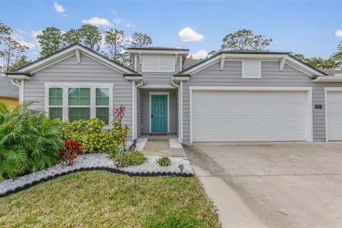 Photo of 38 Sea Breeze Trail, Palm Coast, FL 32164 (MLS # FC307953)