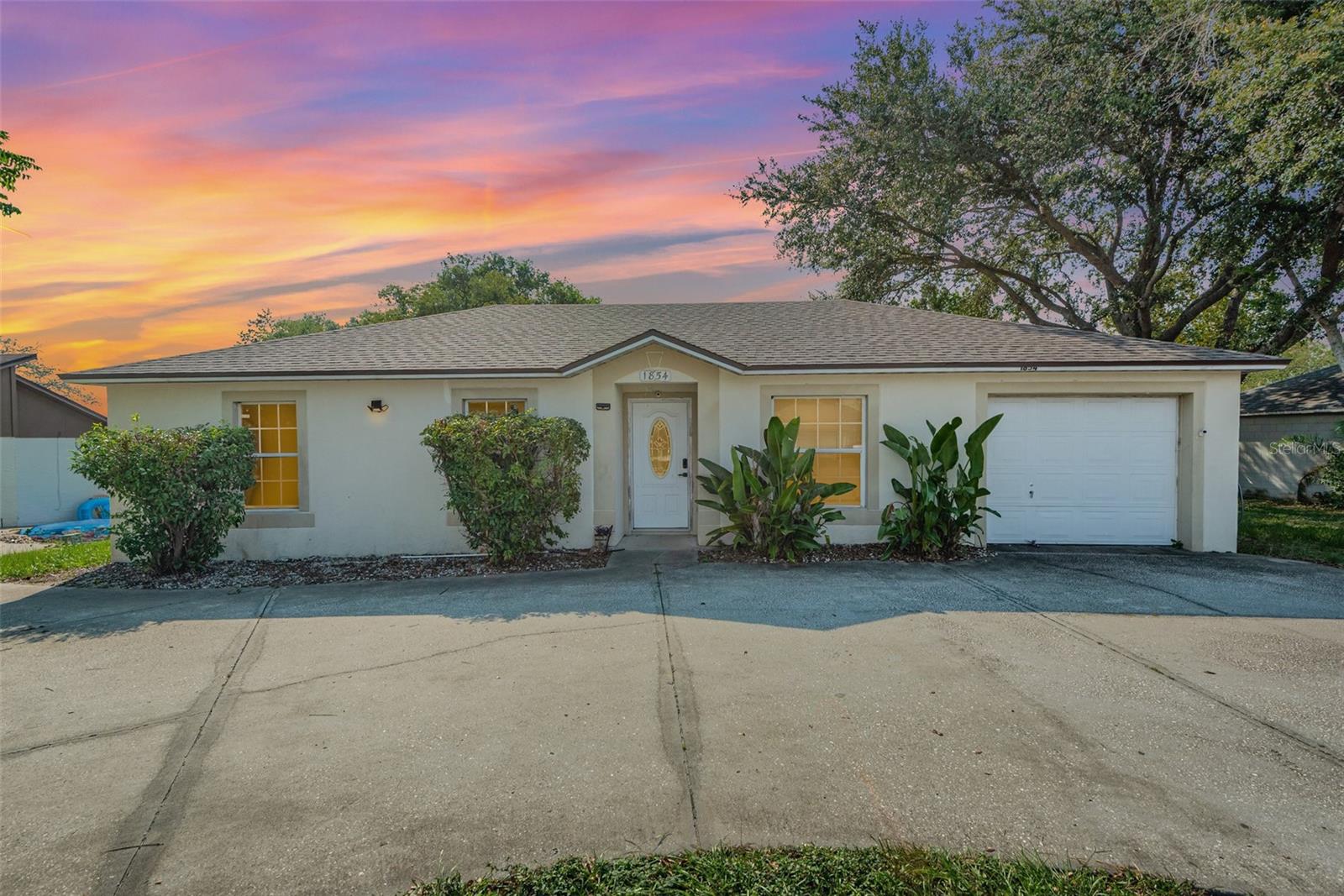 Enjoy this 3 Bedroom 2 Bath sturdy BLOCK home with garage in Deltona. No HOA. High and Dry! Septic pumpout in March 2025. Roof 2021, HVAC 2018. Water heater 2022, No carpet, all ceramic tile. new insulation in attic April 2025, Eat-in Kitchen features all wood cabinets and granite countertops, dishwasher, and garbage disposal, Stainless steel Kenmore refrigerator. Open concept eat-in kitchen overlooks the serene HUGE 1/3 acre backyad, perfect for gatherings. Close to shopping and entertainment. Near I-4 with easy access to the beaches and also to Orlando. All information deemed reliable but not guaranteed and should be independently verified. If qualified with preferred lender, a $1500 credit will be offered.