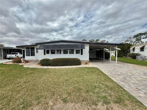 Photo of 104 Dogwood Trail, Leesburg, FL 34748 (MLS # G5106862)