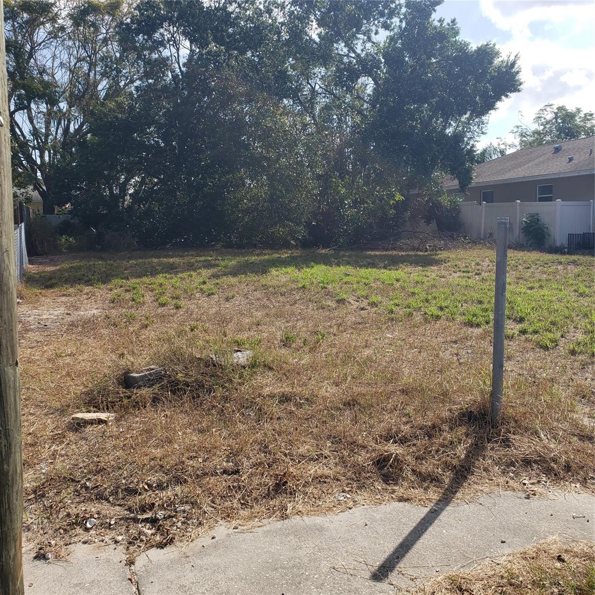 Location, location, location! Here is your chance to build your dream home or investment property on this prime lot in the heart of Tarpon Springs! Zoned Residential, It is on a quiet and nice dead end street that has a beautiful pond at the end. There are public water and sewer that can be connected for the new home. There are other new construction homes cross the street. NO HOA, no CDD and no Flood Zone! Centrally located barely 5 minutes from Lake Tarpon, only 10-15 minutes from the intracoastal, Tarpon Springs' iconic Sponge Docs, and beautiful beaches, including Howard Park Beach, and across the street from Innisbrook Golf Resort.