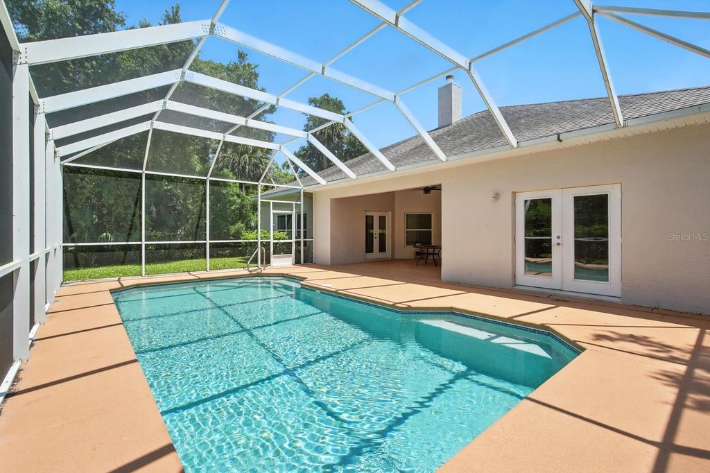 Photo of 7 Old Mcduffie Circle, Ormond Beach, FL 32174 (MLS # FC311495)