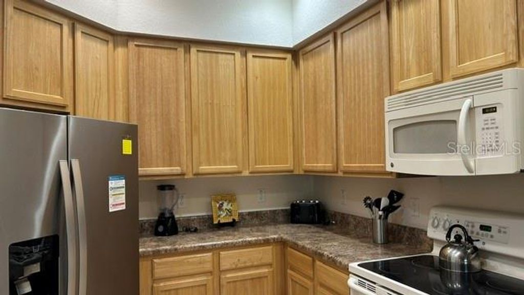 Photo of 3060 Pirates Retreat Court #407, Kissimmee, FL 34747 (MLS # O6408163)