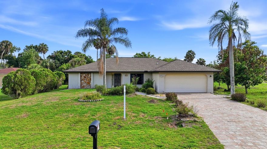 Opportunity awaits in this 3-bedroom, 2-bath pool home offering a spacious and functional layout with great bones and key system updates already completed, including a new roof, new HVAC system, and new septic system (awaiting installation now)—providing peace of mind for the next owner.** (Some images are virtually staged)
Inside, the home features a welcoming foyer with coat closet, a vaulted ceiling in the large main living room, and pocketing sliding glass doors that open to a large screened lanai and pool. Perfect for entertaining or big family dinners, the separate dining area is just off of the living room. The spacious kitchen includes granite countertops, a pantry closet, lots of cabinet storage and a handy eat-in dining nook great for light meals. To the back of the home you will find a terrific additional living space provided by a family room that opens to the lanai with sliding glass doors—ideal for indoor-outdoor Florida living.**

The split-bedroom floor plan offers privacy, with the primary suite positioned on one side of the home featuring a walk-in closet, en-suite bath with shower, linen storage, and direct access to the pool area. Two guest bedrooms are located on the opposite side, connected by a full bath with tub/shower combination, including one bedroom with direct bathroom access via a pocket door.

Additional features include tile flooring throughout the main living areas, a laundry room with utility sink and a handy additional toilet, gutters all around, and a storage shed.**

This home is priced to reflect the need for cosmetic updates, offering an excellent opportunity to personalize and add value.

***Bonus Opportunity: Three adjacent cleared lots are available for purchase separately at $22,000 each — ideal for expanding your property, building additional homes, or creating a private compound. Seller is willing to negotiate a package purchase.*** Contact listing agent for details.