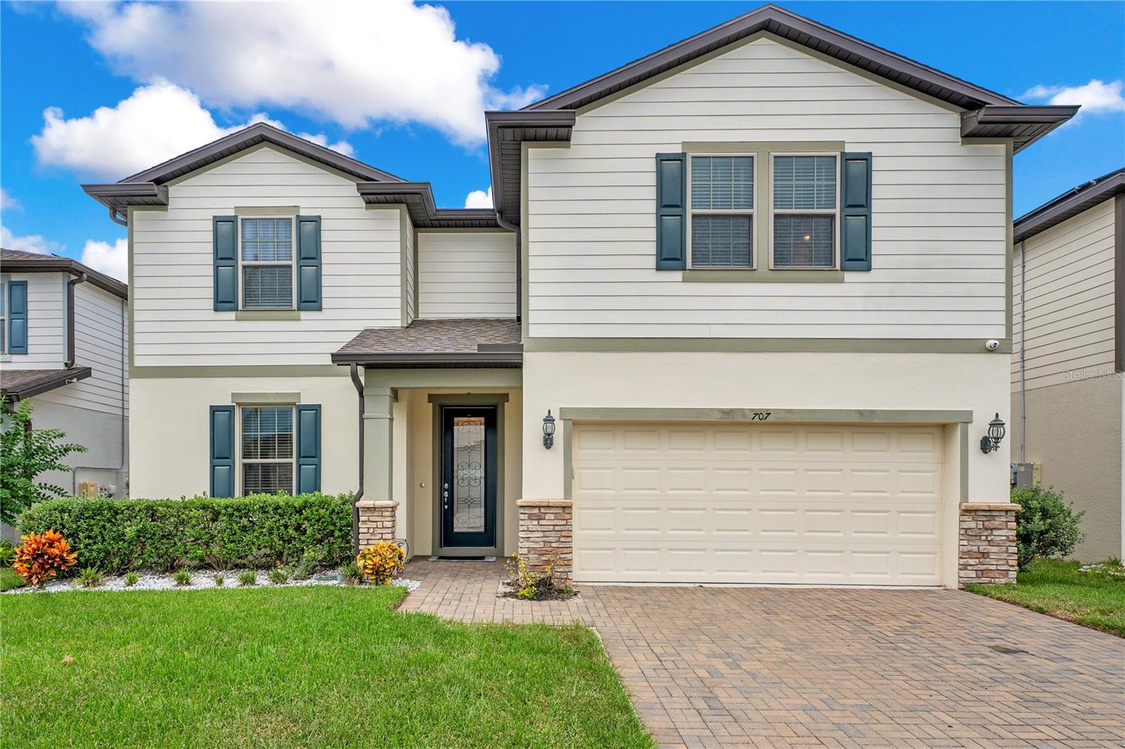 Welcome to Citrus Isle, where style, comfort, and convenience come together in one stunning home. With nearly 3,000 square feet of living space, this residence is more than just a house. It is a place designed for living beautifully. On the main level, the open layout draws you in with soaring ceilings, recessed lighting, and an oversized kitchen island that invites gatherings with friends and family. The master suite feels like a retreat with its garden tub, double vanity, and spacious walk-in closet. A versatile flex room offers endless possibilities, whether you need a home office, playroom, or creative lounge. The main level also includes a convenient half bath, a laundry room with custom cabinetry and sink, and a two-car garage finished with upgraded flooring and storage.
Upstairs, a generous family room with built-in surround sound is ready to become your favorite hangout. It is the perfect space for movie nights, game days, or simply relaxing. Each bedroom has been enhanced with custom touches, and one enjoys the privacy of its own en suite bath. Smart home technology along with a newer roof, AC, and water heater provide peace of mind while you enjoy every corner of this thoughtfully designed home. Step outside to a private backyard retreat. The oversized screened patio is perfect for entertaining, dining al fresco, or simply enjoying Florida living without the bugs. Beyond the patio, the yard opens directly to a park, giving you a rare blend of privacy and connection to the outdoors. As part of the community, you also have access to the sister property which features a sparkling pool, a dog park, and another park for even more room to enjoy. Citrus Isle is close to shopping, dining, and schools, and HOA fees remain under $300 a year. Every detail of this home has been designed with comfort and style in mind. Discover it for yourself with a private tour before it is gone.