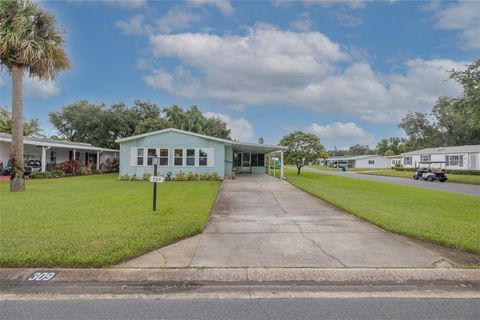 Photo of 309 Schooner Avenue, Edgewater, FL 32141 (MLS # O6349047)