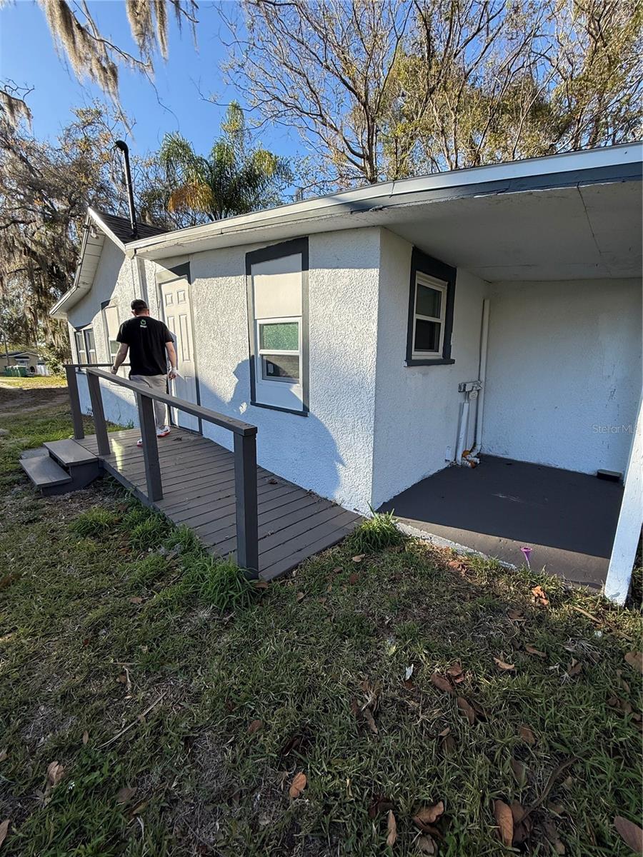 Discover modern living in the heart of Eustis with this fully renovated home at 205 S. Grove St. Just steps away from downtown shopping, dining, and entertainment, this property features a convenient front ramp for easy accessibility. Inside, enjoy brand-new kitchen appliances, sleek granite countertops, new flooring, and fresh paint throughout. Don’t miss out on this prime location and move-in-ready gem!