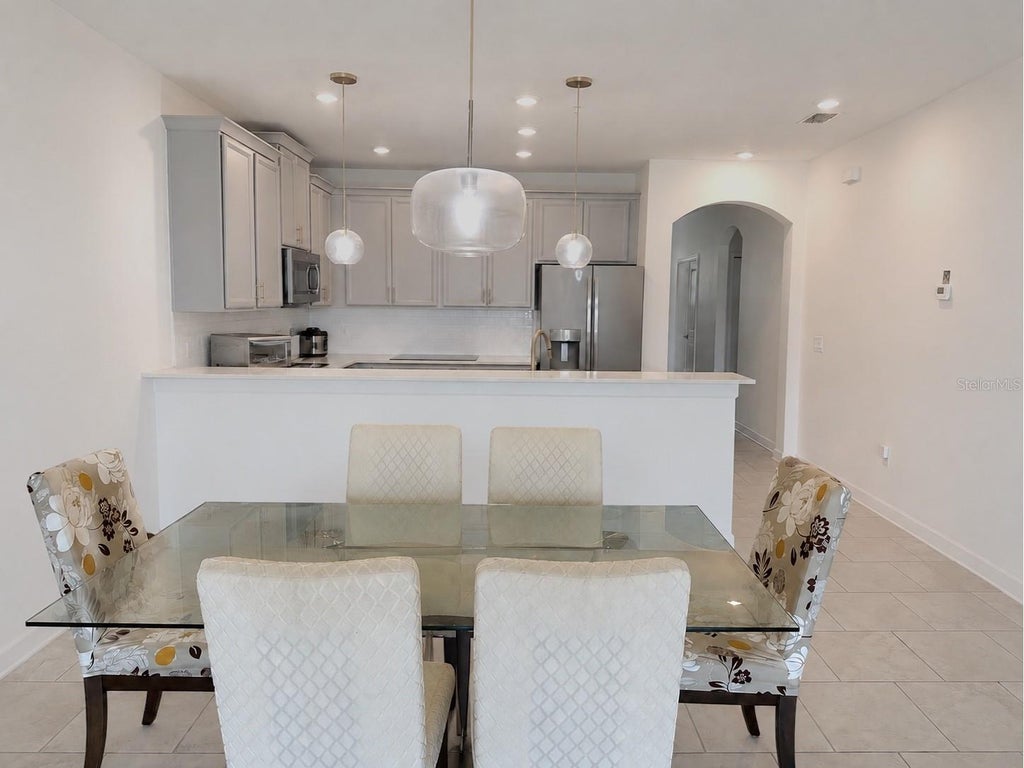Photo of 8990 Azalea Sands Lane, Davenport, FL 33896 (MLS # O6433138)
