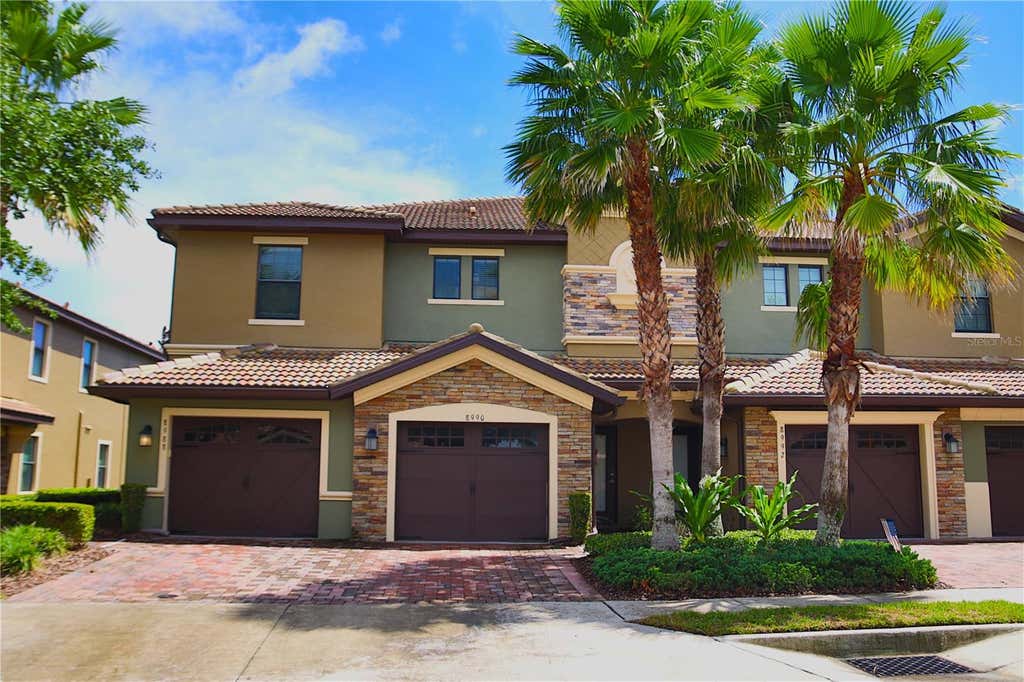 Photo of 8990 Azalea Sands Lane, Davenport, FL 33896 (MLS # O6433138)
