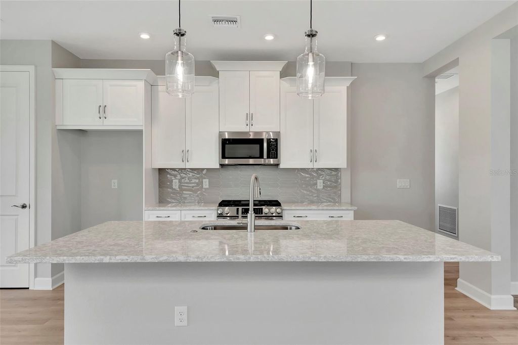 Photo of 1459 Santorini Way, Tavares, FL 32778 (MLS # O6309244)