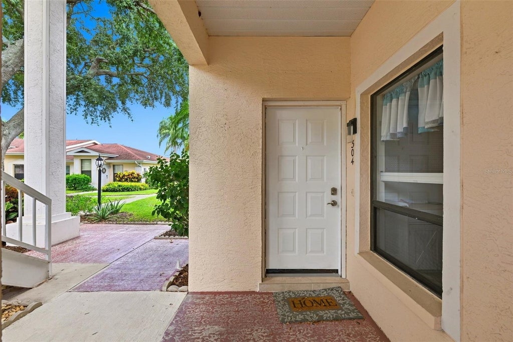 Photo of 304 Kelsey Way, Sun City Center, FL 33573 (MLS # TB8545442)