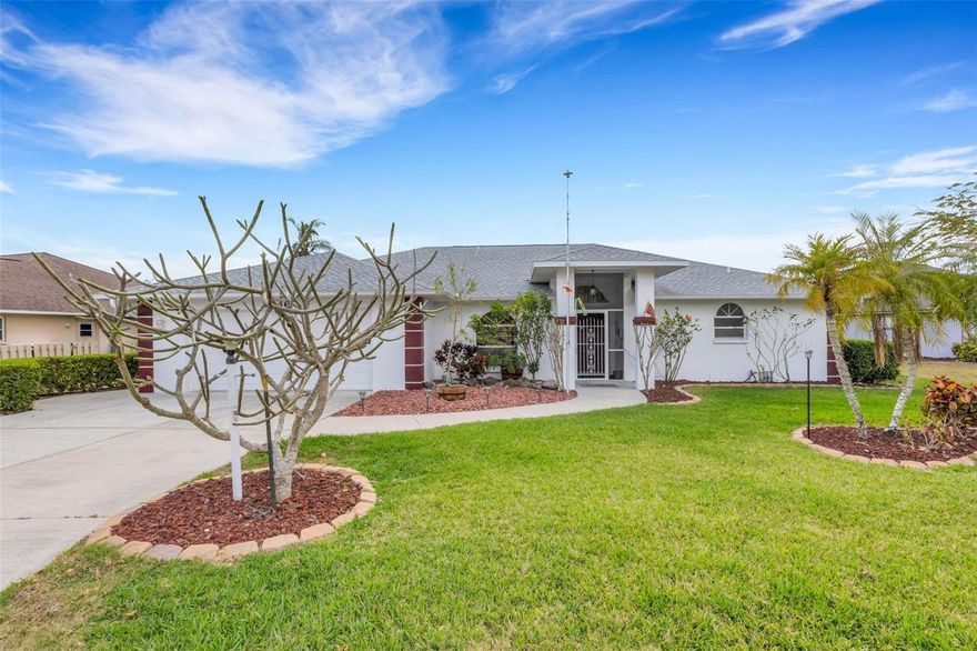 LET THE SUN SHINE IN!  Come explore this waterfront beauty in Cedar Creek - North Sarasota, where serene pond views and indoor-outdoor living come together beautifully. This 3-bedroom, 2-bath home offers approximately 2,100 square feet of living space on a generously sized lot perfectly positioned to capture water views from nearly every room.  Double front doors open to a vaulted-ceiling living room with sliders that immediately draw your eye to the sparkling pool and wide pond view beyond. The natural light pouring in creates a warm and inviting first impression that only gets better throughout the home.   Designed for both comfort and entertaining, the layout includes separate living and dining rooms plus a stunning family room featuring a stone wood-burning fireplace and a full wall of custom built-ins adjacent to the kitchen. The bright kitchen offers shaker cabinetry, dark granite countertops, a pass-through window to the lanai, a newer dark stainless GAS range giving you the convenience of propane cooking — a true chef’s dream.  All three bedrooms feature walk-in closets and mounted 50+” TVs, with the 2nd bath featuring a door to access the pool area.  The spacious primary suite includes a custom-designed closet maximizing every inch of space and sliding glass doors that open directly to the lanai and pool.  Outdoor living shines with four sets of sliders leading to the pool area, creating seamless indoor-outdoor flow. The large lanai is under roof, offering plenty of room to add an outdoor kitchen and dining area. The screened pool enclosure was replaced in 2024, and poured sidewalks surround the home for clean, easy access all around.
For peace of mind, major improvements include • Roof replacement in 2021 • New A/C and water heater in 2022 - there are so many features here, get the full list!  Low HOA fees of just $200/quarter and no CDD make this home even more attractive.  Location is here as this community is just 4 miles from UTC and all it has to offer - restaurants, shopping, Benderson Park, and tons more close by! Don't let this opportunity pass you by!