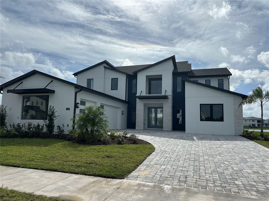 SOLD DATA ONLY.  Toll Brother Corbeil Modern floor plan. Conveniently located close to A-rated Orange County schools and a short drive from Orlando International Airport, Laurel Pointe Lake Nona will be near top shopping, dining, arts, and recreation destinations, including Lake Nona Town Center. Major highways are easily accessible, offering homeowners easy access to Orlando’s theme parks, sporting arenas, stadiums, and more. Robust educational and healthcare offerings are within a five-mile radius of the neighborhood, including three university campuses and a world class health and life sciences district veterans’ hospital and adult teaching hospital. Recognized as a smart city of technology, innovation, and wellness, Lake Nona is one of the country’s fastest growing master-planned communities, encompassing 17 square miles, and home to a collaborative network of businesses across the healthcare and life sciences, sports and performance, and transportation industries. It is Central Florida’s best-selling community and home to one of the richest events and programming calendars in the nation. Additionally, residents of Laurel Pointe will have access to Lake Nona's expansive amenities including trails, parks, wellness program, and more.