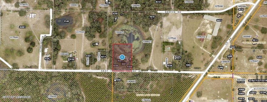 Explore the potential of this 1.44-acre vacant  lot at 9239 E Treasure Island Avenue in Leesburg, Florida (34788) "Zoning: A". Offering a generous size, this parcel is perfect for building a custom property. Located in a serene neighborhood, it provides privacy while still being conveniently close to schools, shopping, dining, and local amenities. This property presents an excellent opportunity for investors seeking a spacious and well-located piece of land in Central Florida.Note: buyers I emphasize the importance of conducting thorough due diligence to ensure that the property meets your expectations and requirements.