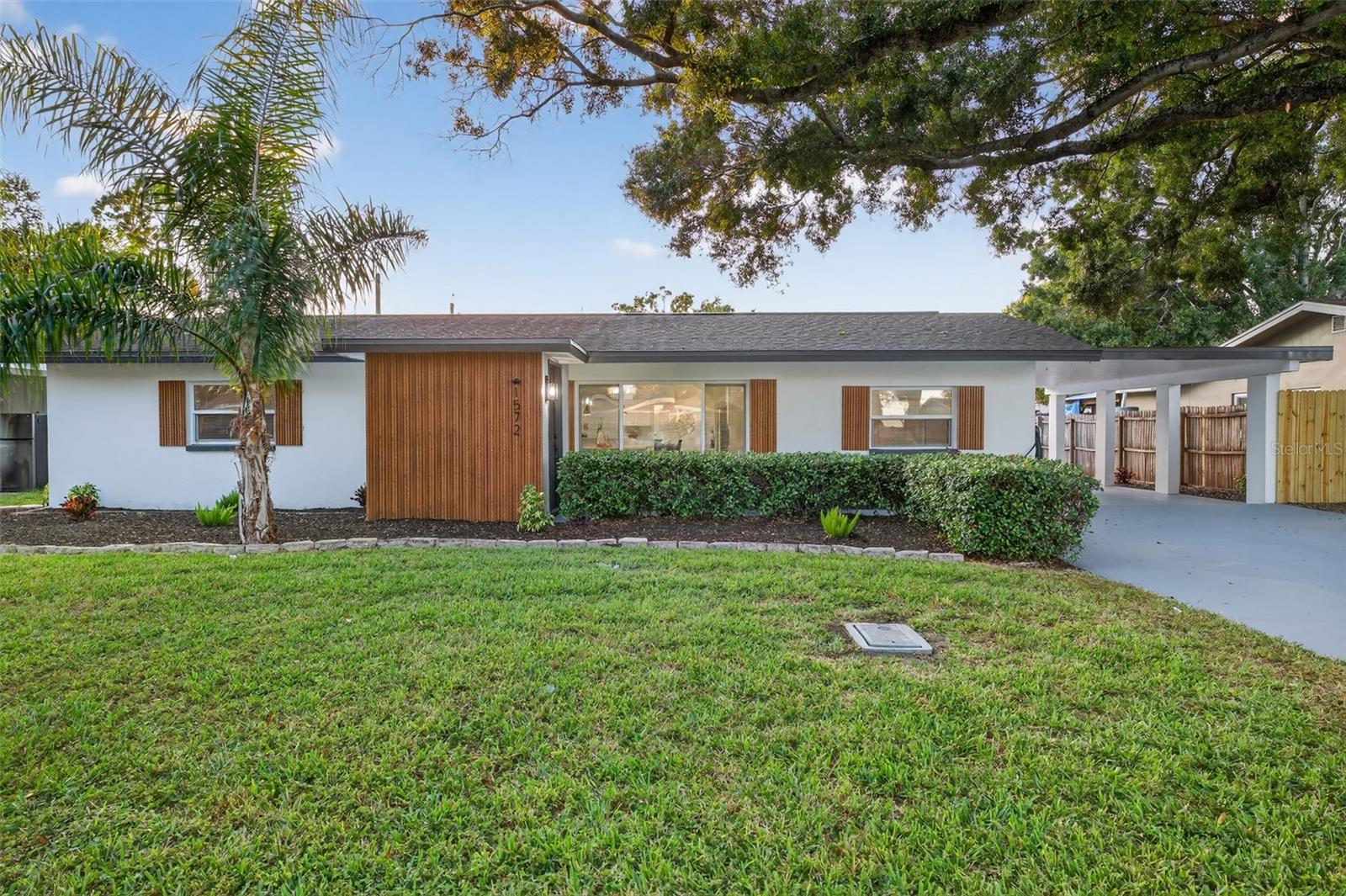 Welcome to your dream home! This beautifully renovated 4-bedroom, 2-bath residence in the heart of Clearwater offers everything you've been looking for. Step inside to find luxurious LVP flooring throughout, modern bathrooms with elegant finishes, and a kitchen that boasts premium Samsung stainless steel appliances, shaker cabinets and stunning Calacatta sunset countertops. Enjoy peace of mind with a brand-new roof and completely updated electrical fixtures. The outdoor space is just as impressive, featuring a refreshed pool and equipment, ample backyard space perfect for entertaining, and plenty of storage. Don't miss the opportunity to make this gorgeous, move-in-ready home yours!